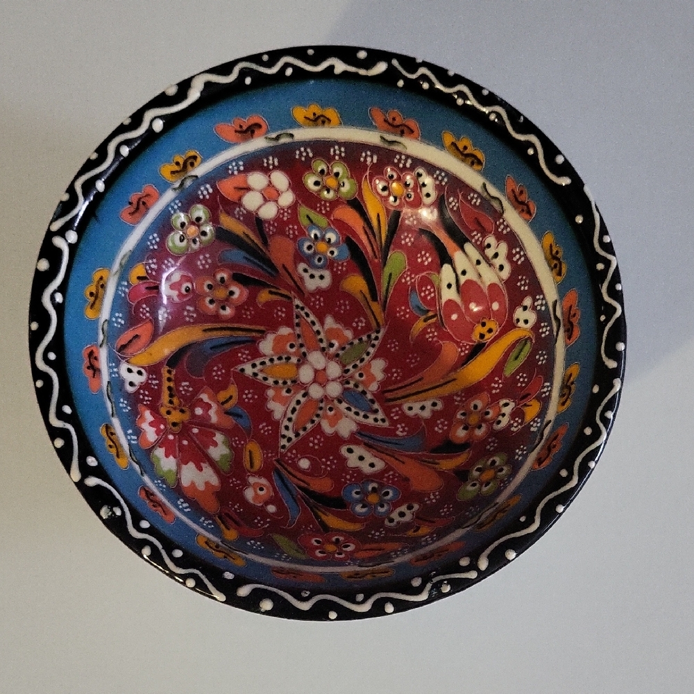 Red and Blue Ceramic Art Bowl with Floral Design
